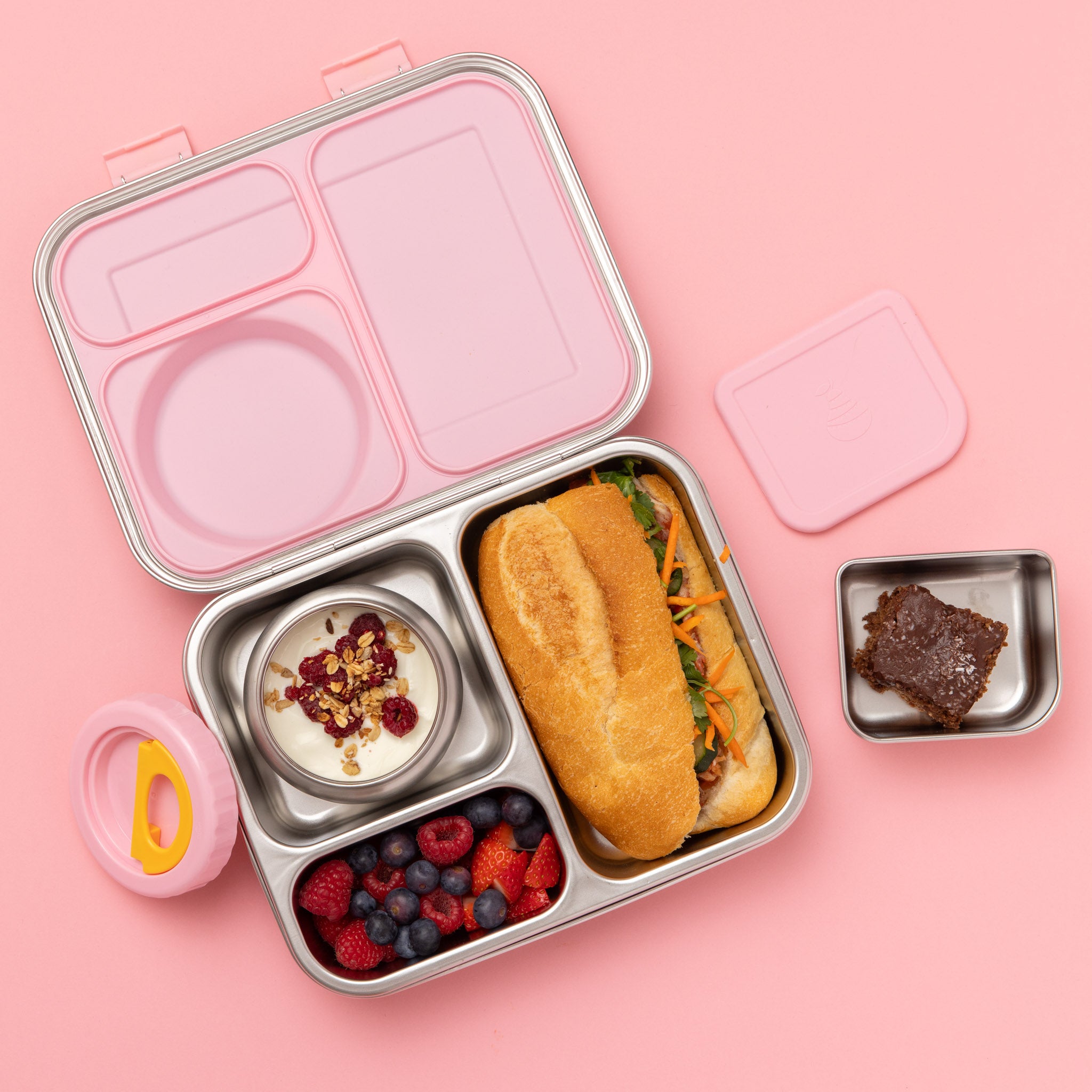 hot n cold hero box stainless steel lunch box with pink silicone seal on lid and snack container with 250ml insulated food jar with pink lid - full of food from above rolls, yoghurt berries